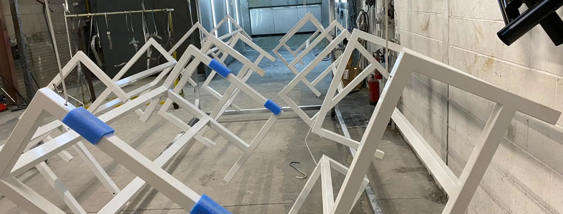 Powder coating frame