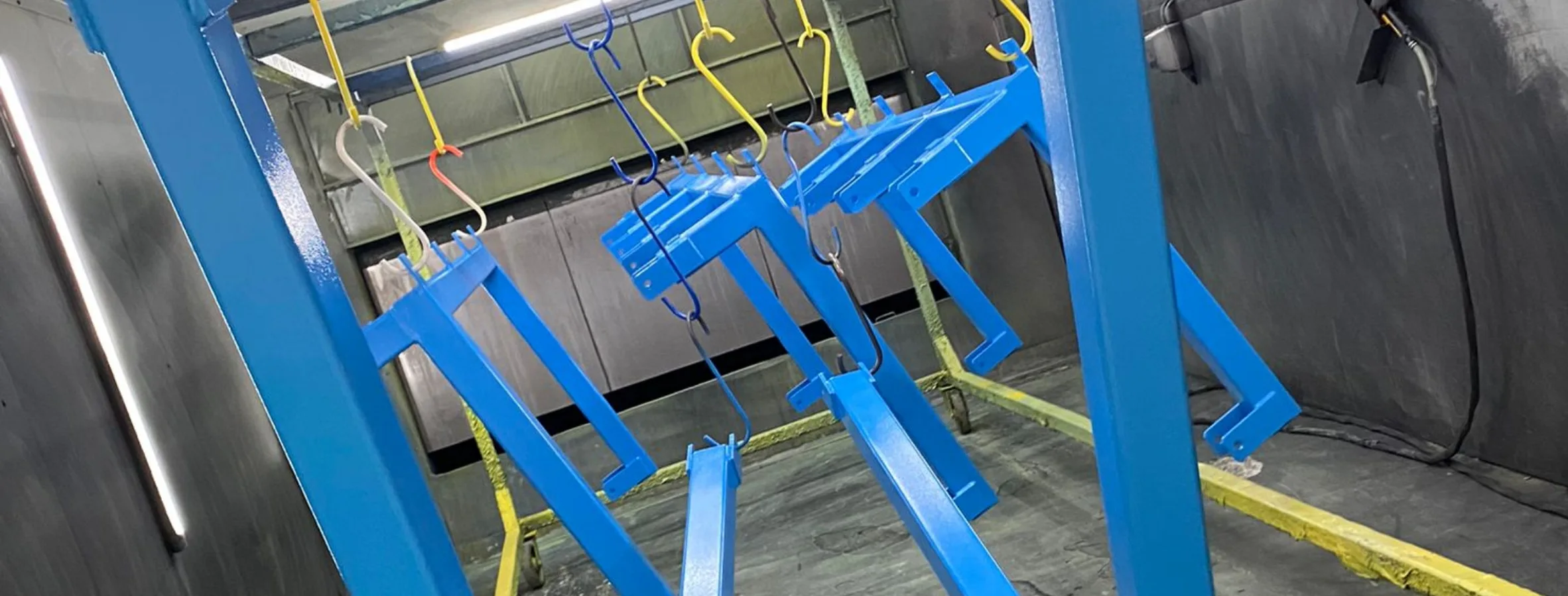 Powder coating frame