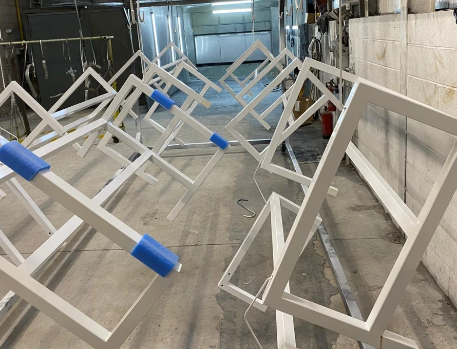 Powder coating frame