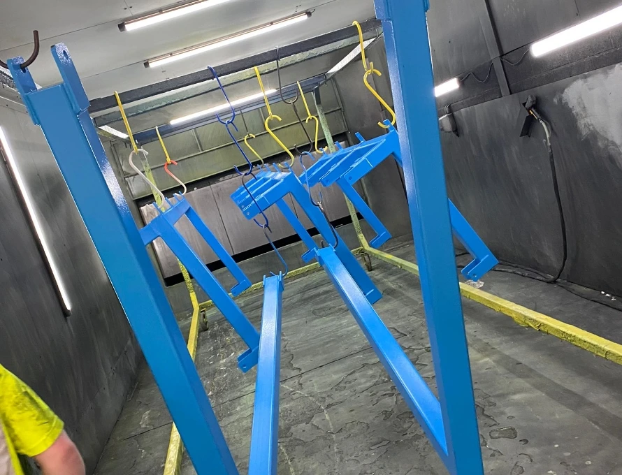 Powder coating frame